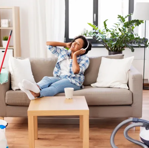 customer listening music while house cleaning service